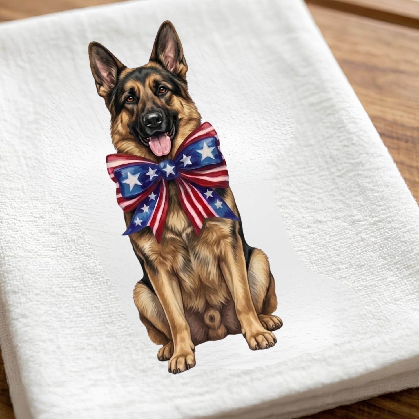 German Shepherd dog with a patriotic bow tie on a white towel