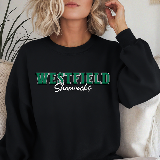 Woman wearing a black Westfield Shamrocks Script Spirit Crewneck Sweatshirt featuring green varsity Westfield lettering with Shamrocks script design on a unisex sweatshirt.