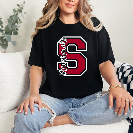 Woman wearing a Sheridan Blackhawks school spirit shirt with red varsity S and Blackhawks lettering graphic