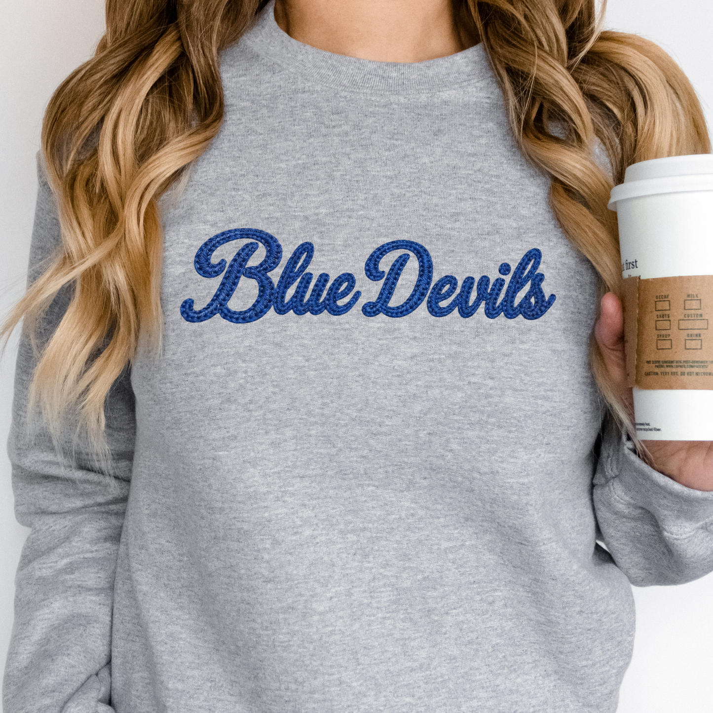 Tipton Blue Devils faux embroidery spirit wear sweatshirt featuring blue vintage stitched script lettering