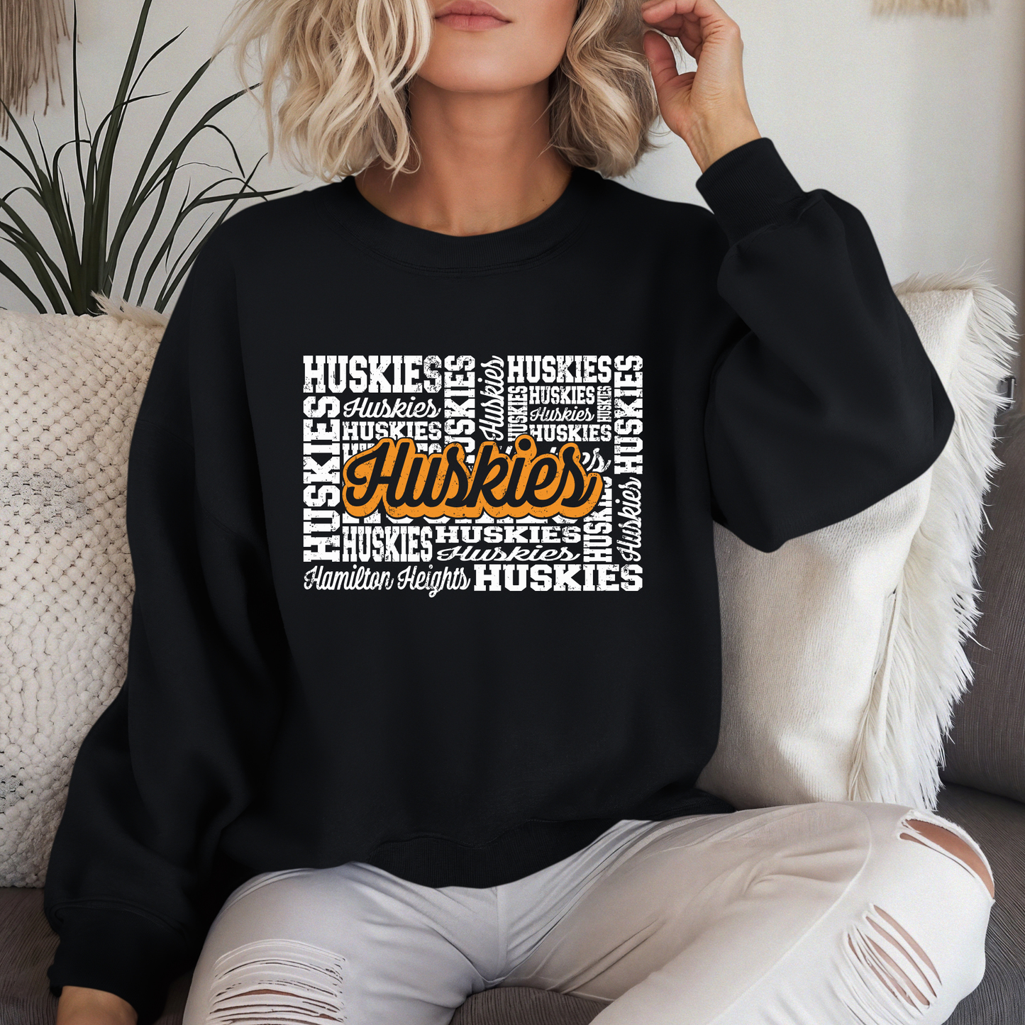 Hamilton Heights Huskies hometown crewneck sweatshirt featuring a vintage-style Huskies collage graphic in orange and white