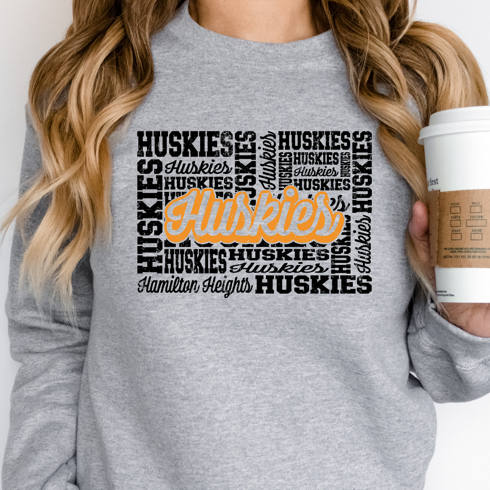White Hamilton Heights Huskies hometown crewneck sweatshirt with bold Huskies spirit wear graphic