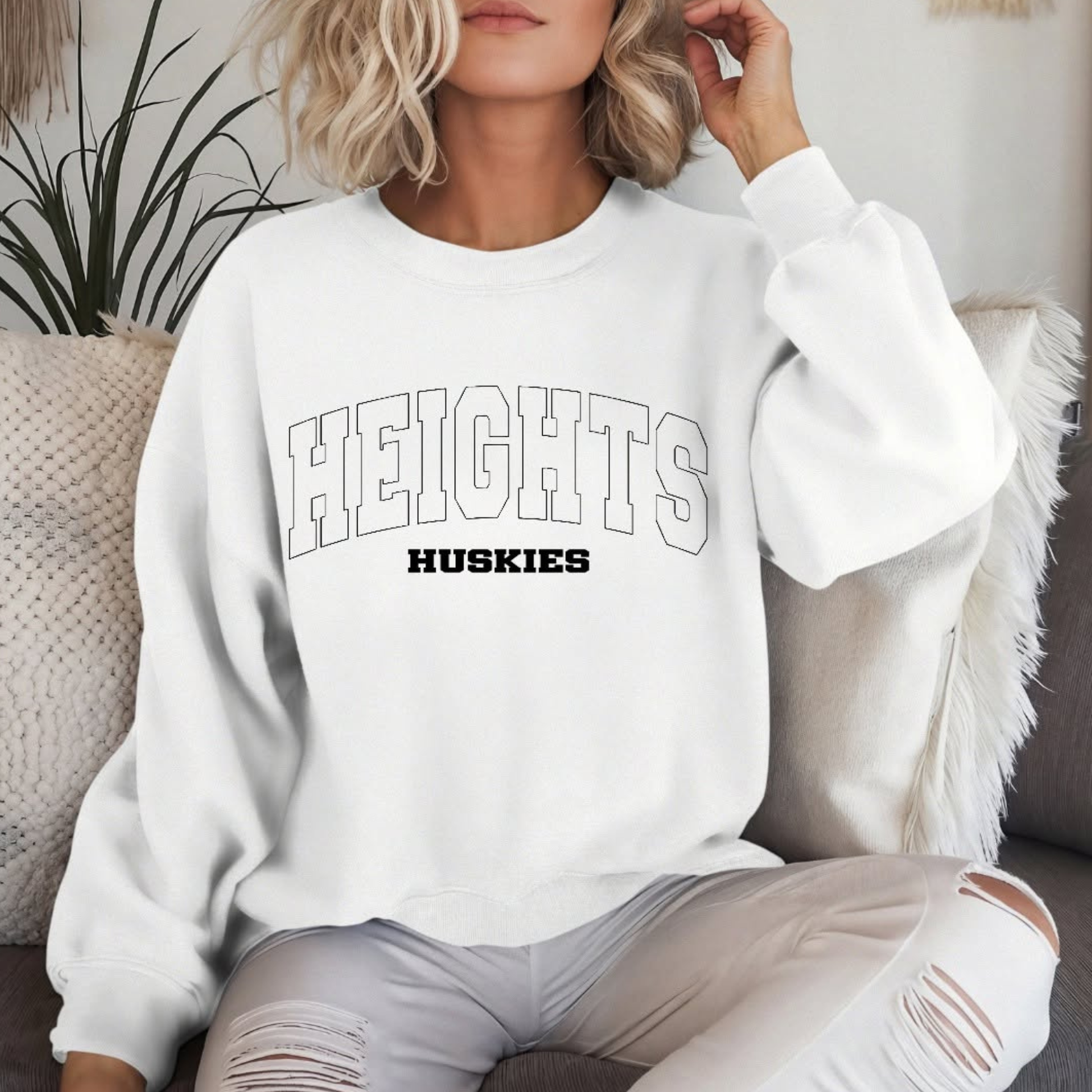Woman wearing Hamilton Heights Huskies collegiate arch spirit wear crewneck sweatshirt