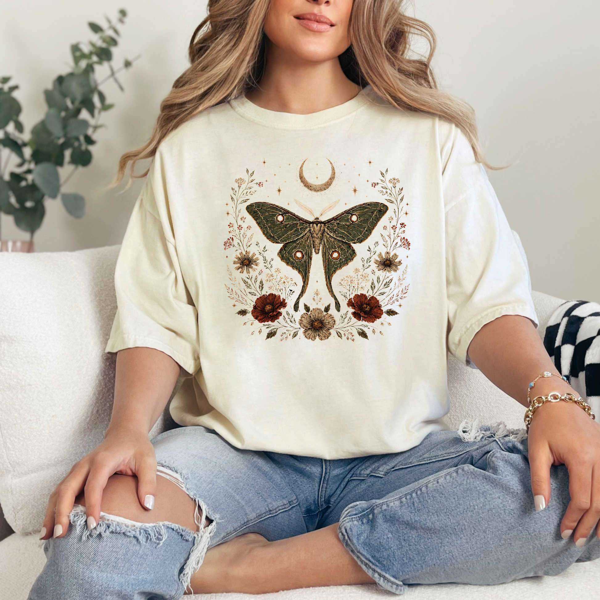 Cream luna moth floral graphic t-shirt with vintage botanical flowers and celestial moon artwork