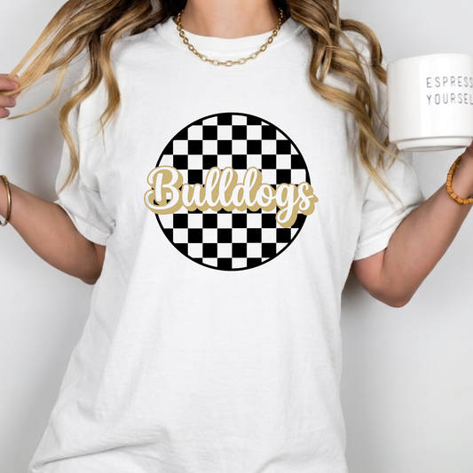 Woman wearing a White t-shirt with 'Bulldogs' design featuring a checkered pattern on a plain background