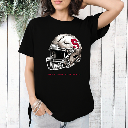 Black crewneck t-shirt featuring a modern Sheridan Blackhawks football helmet graphic and Sheridan Football text on a white wood background.