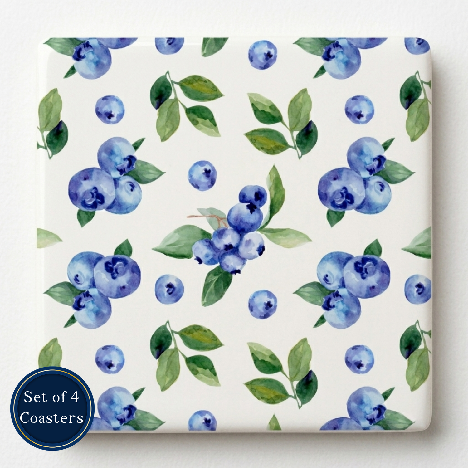 Set of 4 coasters with blueberry pattern on a white background