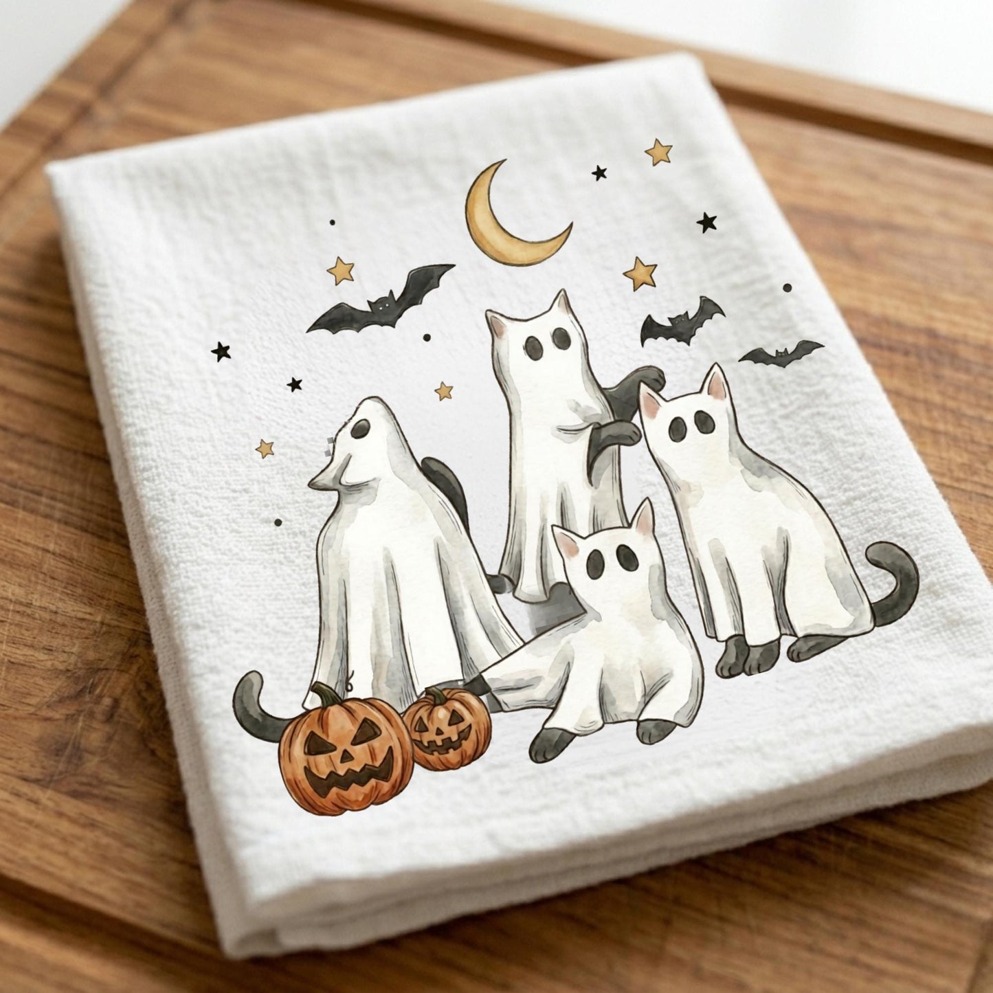 Ghost Cat Halloween kitchen towel featuring four cats dressed as ghosts with pumpkins, bats, stars, and moonlit Halloween artwork