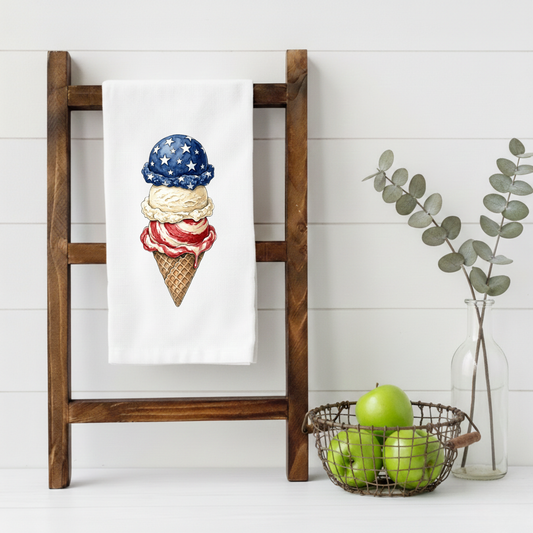 Wooden ladder with a towel featuring an ice cream cone design, basket of apples, and vase on a white background