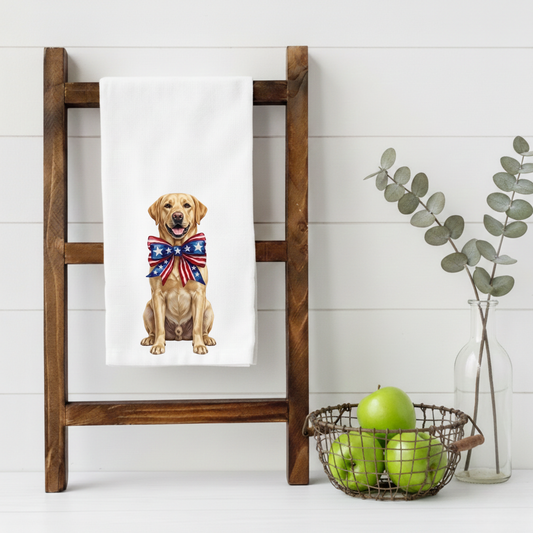 Towel with a Yellow Labrador dog wearing a bow tie hanging on a wooden ladder against a white wall.