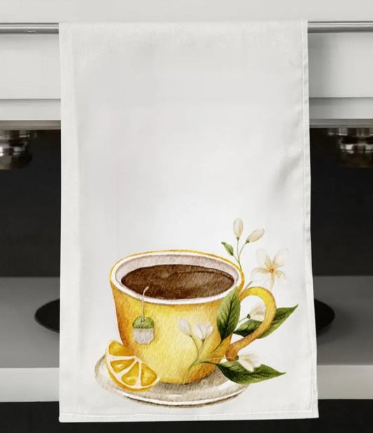 Watercolor tea cup tea towel with fresh lemon slices, tea bag, and delicate floral artwork