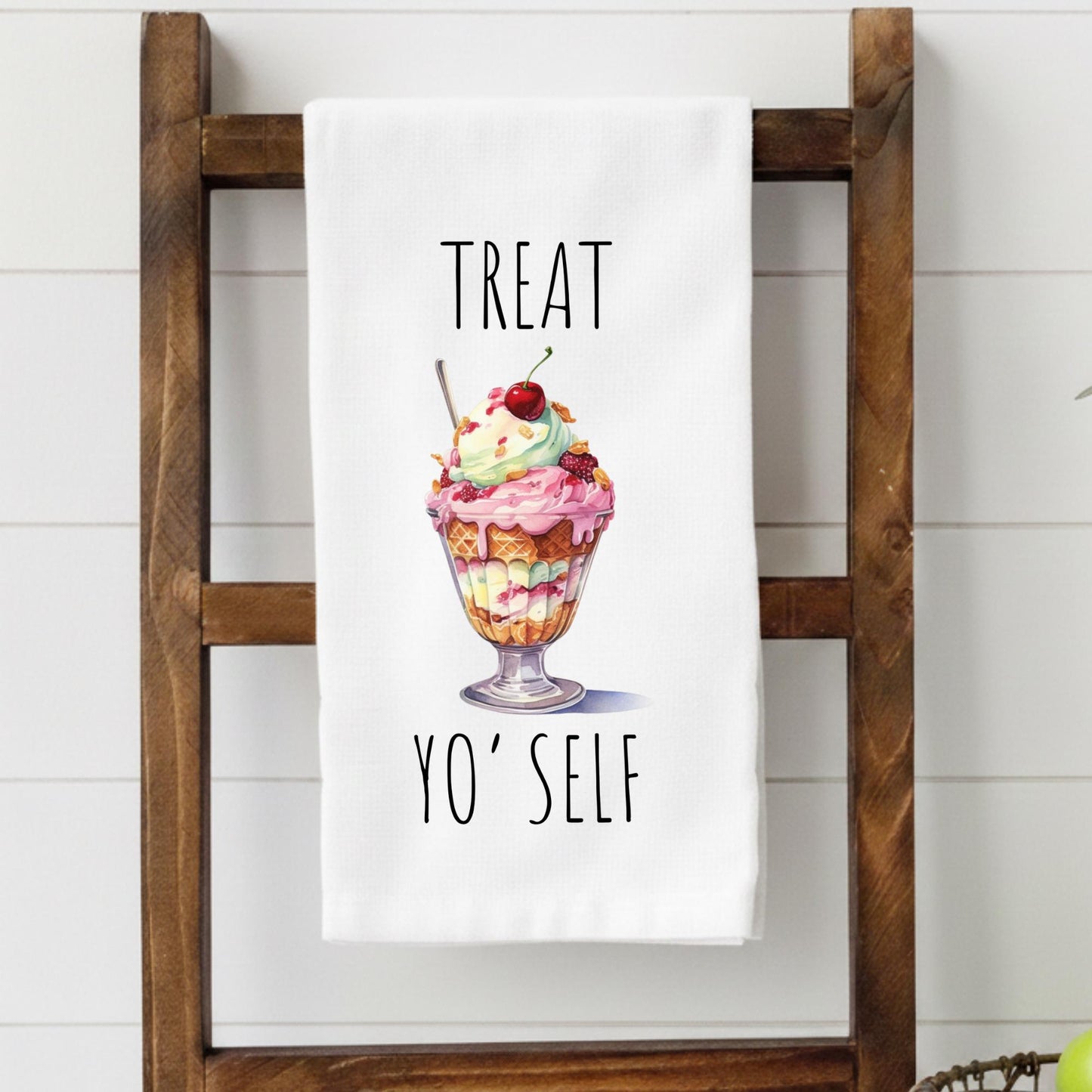 Treat Yo' Self kitchen towel featuring colorful ice cream sundae illustration with cherry topping and funny dessert quote