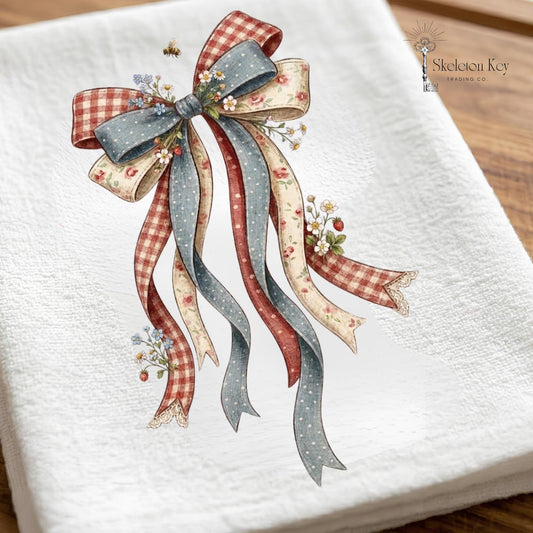 Vintage patriotic ribbon kitchen towel with red white and blue farmhouse bow artwork and floral accents