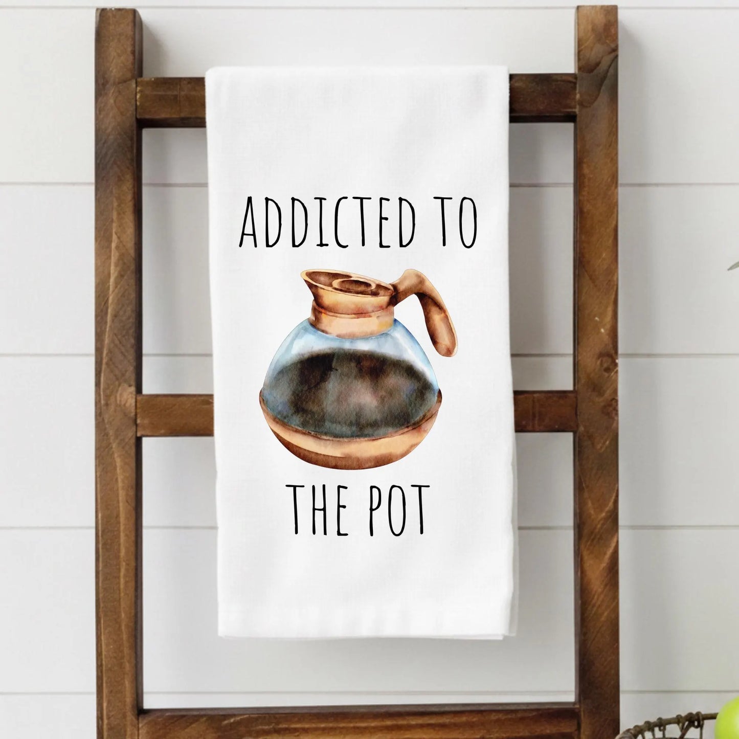 Addicted to the Pot kitchen towel featuring a watercolor coffee pot illustration and funny coffee lover saying