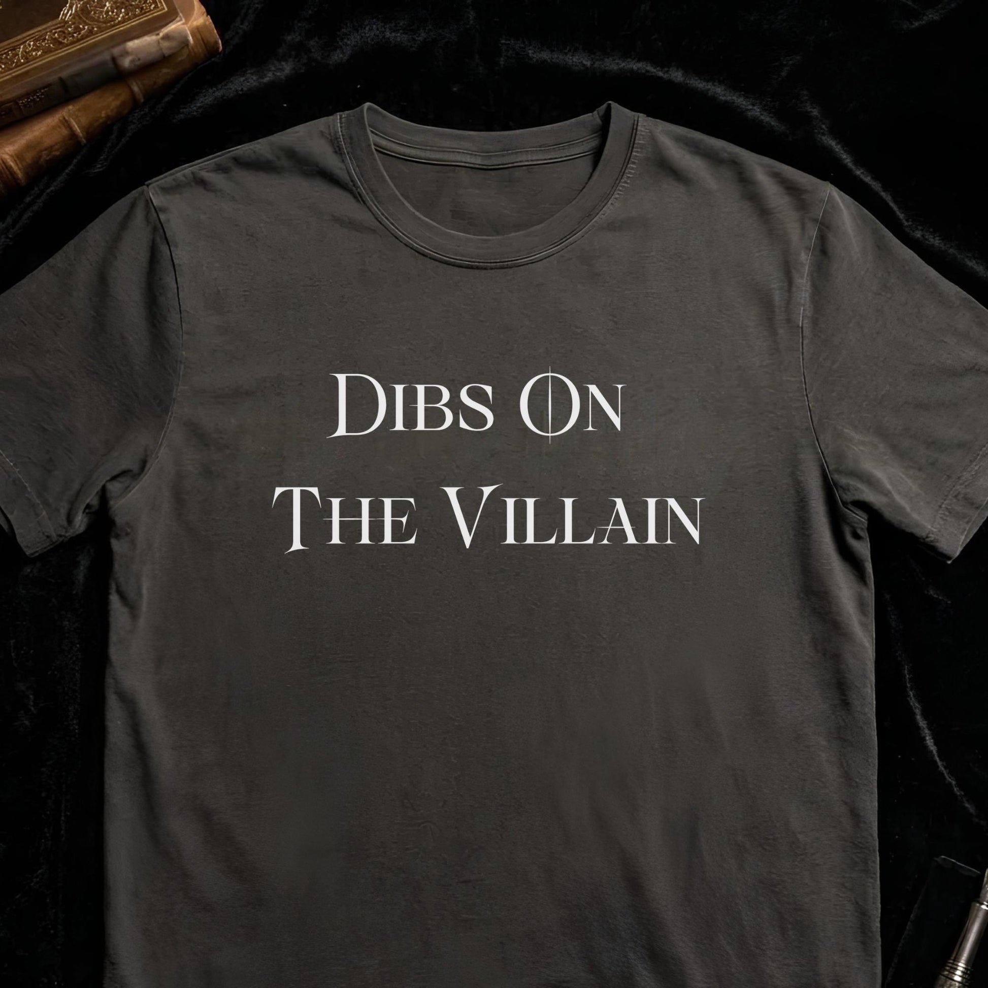 Black t-shirt with 'Dibs on the Villain' text on a dark background